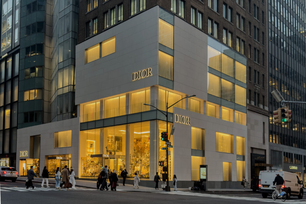 Dior flagship store at 57th and Madison Avenue in Manhattan reflecting golden-hour light on mirrored façade