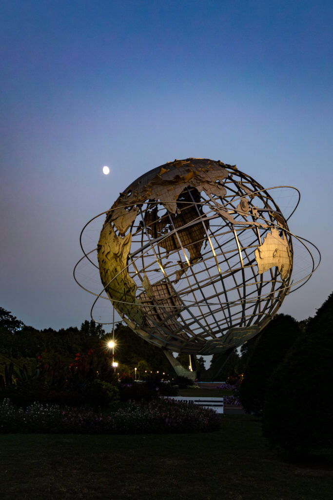 Unisphere in Queens lit at twilight.