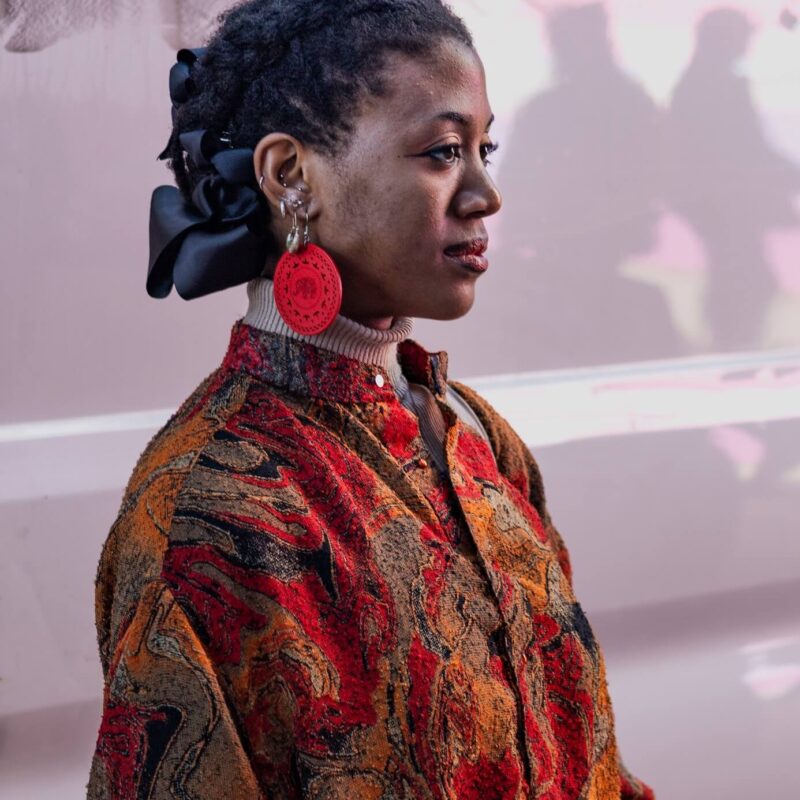 Portrait with Red Earrings